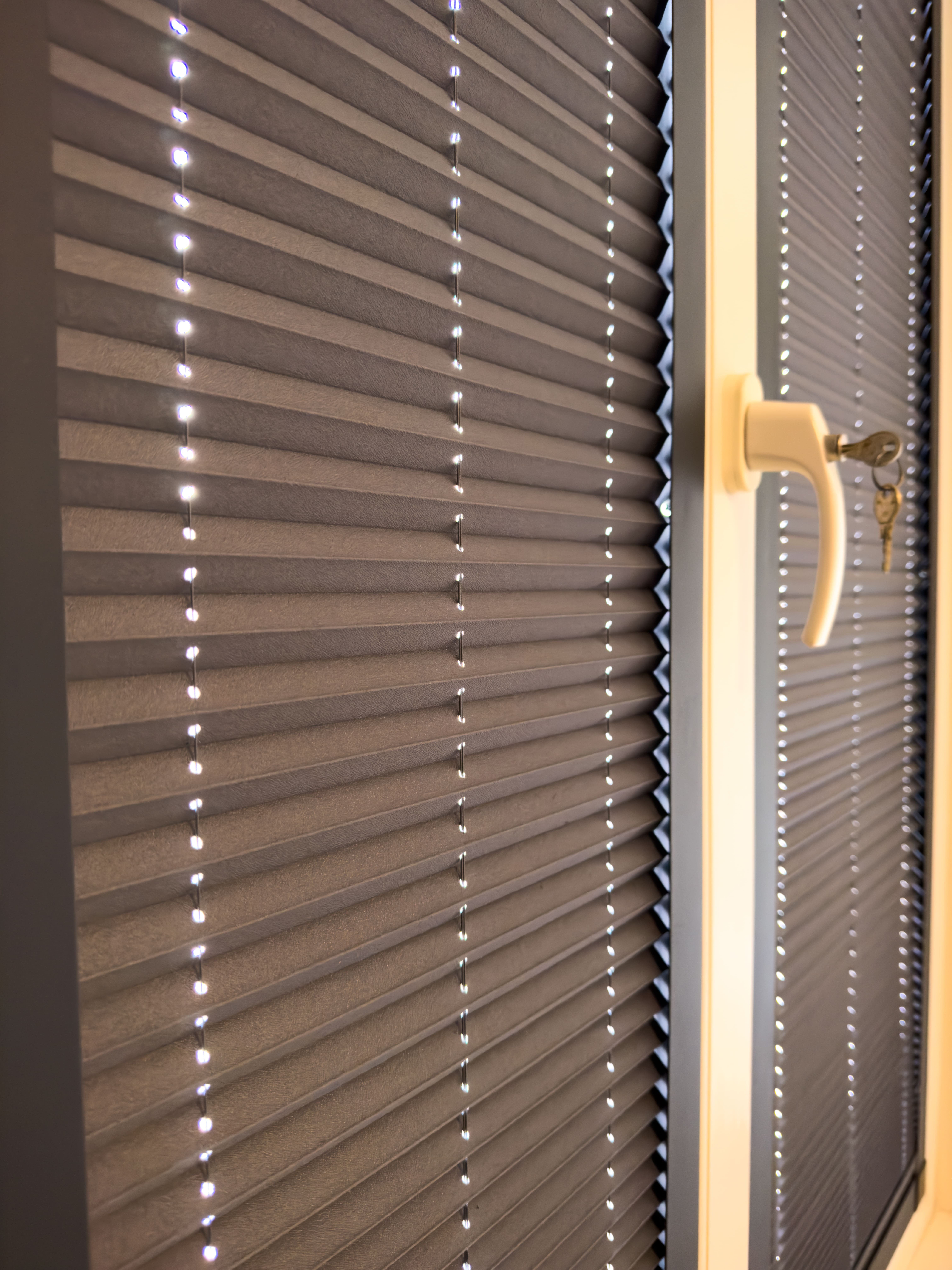 Plisségordijnen in de eetkamer